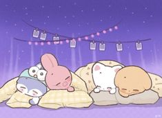 three stuffed animals are sleeping on pillows in front of a string with clothes hanging from it