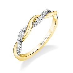 a yellow and white gold ring with diamonds