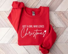 Just A Girl Who Loves Christmas Shirt, Christmas Sweatshirt, Christmas Party, Holiday Winter Shirt, Christmas Women Sweatshirt, Christmas Gift ♥ HOW TO ORDER T-SHIRT ♥ 1- Please, Check and Review all Photos.,  2- Choose your size from the drop-down menu and add each shirt to your cart one at a time. 3- Select Your Shirt Color from Drop-down 2 which is Shirt Color. 4- Choose Your TEXT Color. Please add your text color on to the personalization box. 5- Your shipping will automatically combine when Christmas Vinyl Shirts, Christ Shirts, Christmas Vinyl, Cross Shirts, Filthy Animal, Basic Sweatshirt, Merry Christmas Shirts, Winter Shirts, Vinyl Shirts