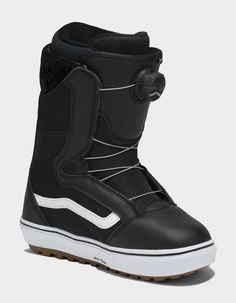 a black snowboard boot with white soles on the bottom and side zippers