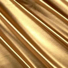 an image of a shiny gold background that looks like it could be used as a wallpaper