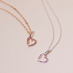 Our new Pink October M Charm Necklace is the Merci Maman Heart, in a new limited edition Pink Crystal for Pink October. This re-designed classic will add a pop of pink sparkle to all your Merci Maman jewelry.18K Champagne Gold Plated or 925 Sterling SilverPink October M Charm: 0.4x0.3 Charms are removable from this chain and can be worn on all Merci Maman chain lengthsSent with love in a complimentary gift box Pink Heart Cut Birthstone Necklace, Pink Birthstone Heart Pendant Necklace, Valentine's Day Pink Sterling Silver Heart Necklace, Pink Heart Pendant Necklace With Birthstone, Pink Heart Necklace For Gift, Pink Fine Jewelry Necklace For Valentine's Day, Pink Sterling Silver Heart Cut Necklace, Fine Jewelry Pink Heart Charm Necklace, Pink Heart Cut Necklace As Gift For Her