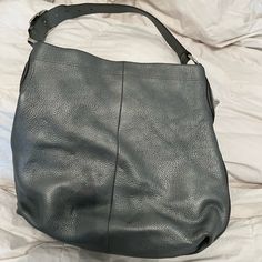 Beautiful Shoulder Bag, The Feel Of Pebbled Leather Is Like Silk. This Bag Is A Gray Charcoal Coal With A Silvery Tinge. Mint Inside And Out No Flaws Detected Bags Coach, Black Pebbles, Pebbled Leather, Coach Bags, Leather Shoulder Bag, Duffle Bag, Mint, Shoulder Bag, Silk