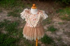 This is a unique dress/romper in a boho style. You can use it for a Bohemian or a fall stylized photo session.  Size: flexible (adjustable ties on the back) 12-18 month Ready to ship! It matches perfect with this headband  https://yourdreampixllc.etsy.com/listing/1530914405 All used materials are vintage and new. All items are made with care in a smoke/pet free environment. I would like to invite you to Your Dream Pix LLC VIP customers group! Please, join us for all news and updates from my shop, new products, SALES and discounts. https://www.facebook.com/groups/550907811777869/ Thank you! Summer Cottagecore Fairy Dress With Ruffles, Summer Whimsical Fairy Dress For Dress-up, Whimsical Fairy Dress For Summer Dress-up, Brown Cottagecore Dress For Summer, Bohemian Cream Dress For Festive Occasions, Cream Bohemian Dress For Festive Occasions, Bohemian Festive Dress With Ruffles, Cream Summer Dress For Festive Occasions, Summer Festive Cream Dresses