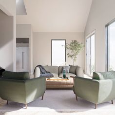 a living room with two couches and a coffee table in front of large windows