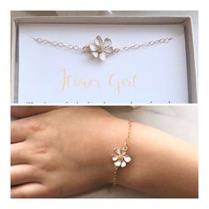 two pictures of a woman's hand with a bracelet and flower charm on it