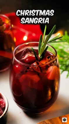 christmas sangria with cranberry and rosemary garnish