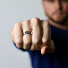 This ring is forged with high quality stainless steel and looks amazing on any guys hand. Don't know your ring size? Go here: etsy.com/listing/769243955/finger-ring-sizer-by-modern-out US Sizes 9, 10, 11, 12 7mm thick Made of stainless steel ► For longer lasting quality, please keep jewelry dry and away from chemicals. Jewelry care instructions come with every order. ► International orders are subject to tax/duty fees. This is uncontrollable on our end. Shipping can take up to 6 weeks due to cus Durable Silver Promise Ring, Silver Titanium Promise Ring, Minimalist Titanium Rings For Anniversary, Stainless Steel Engraved Ring With Polished Finish For Promise, Stainless Steel Polished Engraved Promise Ring, White Gold Titanium Promise Ring, Stainless Steel Ring With Polished Finish For Promise, Stainless Steel Engraved Ring For Promise, Silver Tungsten Carbide Ring As Gift