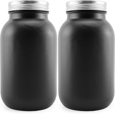 two black jars with silver lids sitting side by side