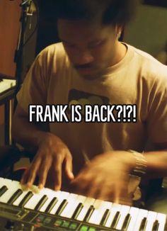 a man sitting at a keyboard with the words frank is back?