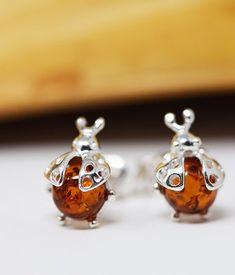 Materials: Sterling Silver 925, Real baltic amber Ladybug earrings, Sterling Silver Ladybug studs, Amber earrings, Bug earrings, Ladybug jewellery, Ladybug gifts Bug Earrings, Ladybug Earrings, Ladybug Jewelry, Amber Earrings, Add Ons, Dream Jewelry, Earrings Sterling Silver, Baltic Amber, Cool Items