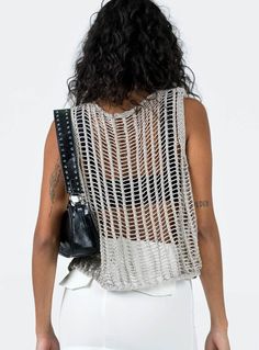 Show off your trendsetter style in this allery crochet knit sleeveless tank. Crafted from lightweight, airy fabric, this stylish tank is perfect for all your summer looks. It's the perfect companion for your shorts, jeans, and skirts! (And yeah, you look totally hot in it). Size Guide: Model is 5’5” tall, and has a 33.1” bust, 24.6”waist, & 37.2” hips. She is wearing a S / US 4 / AU 8. This tank is true to size. Material: 100% Acrylic. Key Features: Relaxed fit. Pull-on. Crochet Knit Fabrication Shorts Jeans, Color Free, White Crop Top, Sleeveless Tank, Summer Looks, Trend Setter, Size Guide, Gray Color, Relaxed Fit