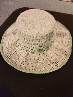 This is a crocheted floppy sun hat and matching small bag.  The hat has a draw string to loosen or tighten.  The hat will fit in the bag or the bag can be used for phone, wallet, change etc. Casual Crochet Lace Hat For The Beach, Beach Hat With Crochet Lace And Adjustable Fit, Beach Hat With Adjustable Crochet Lace, Summer Beach Hats With Crochet Lace, Summer Beach Hat With Crochet Lace, Crochet Lace Hats For Summer Beach, Crochet Lace Summer Beach Hats, Beach Crochet Hat Made Of Yarn, Summer Beach Crochet Lace Hats