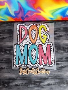 a sticker that says dog mom on it