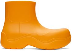 Ankle-high waterproof rubber boots in orange. · Bonded jersey lining · Treaded rubber sole Supplier color: Tangerine | Bottega Veneta Orange Puddle Boots Puddle Boots, Shoes Boots Ankle, Shoe Boutique, Hot Sneakers, Rubber Boots, Black Leather Boots, Shoe Game, Boot Shoes Women, Bottega Veneta