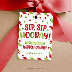 a gift tag that says sip sip hooray wishing you a happy holiday from nicole