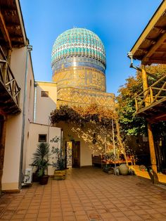 a building with a dome in the middle of it