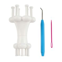 a toothbrush holder with several teeth and a blue handle next to it's contents