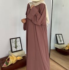 A very elegant dress. It is quite abundant in terms of shape and size. Suitable for all sizes. The length is made according to the person. Modest Floor-length Abaya, Modest Solid Color Floor-length Abaya, Long Solid Niqab For Eid, Solid Long Niqab For Eid, Elegant Long Sleeve Brown Abaya, Long Solid Color Hijab For Eid, Solid Color Long Maxi Dress For Eid, Solid Color Abaya With Modesty Panel For Eid, Maxi Length Hijab For Eid