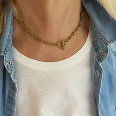 "This figaro chain necklace features a toggle bar closure front and center, making it the perfect everyday piece. Easy to pair with any necklace for the perfect stack. Our gold toggle necklace is the perfect gift for yourself and your loved ones! ---------------------------------------- M A T E R I A L S * 18K gold-plated over stainless steel figaro chain 5mm. * Water-resistant, Tarnish resistant, Hypoallergenic * %100 Nickel & Lead Free * Different Chain lengths, from 14\" to 26\" inches long i Trendy Chain Necklace With Toggle Clasp For Gift, Trendy Toggle Link Necklace For Gift, Trendy Toggle Link Necklace Perfect As A Gift, Trendy Link Toggle Necklace As Gift, Trendy Link Toggle Necklace For Gift, Trendy Toggle Necklace With Clavicle Chain As Gift, Trendy Chain Link Toggle Necklace As Gift, Trendy Toggle Necklace With Lobster Clasp As Gift, Gift Chain Necklace With Toggle Clasp