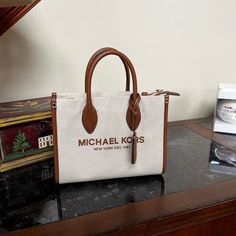 Michael Kors Tote Bag. Brown Leather Detail For Handle. Gently Used. In Good Condition. Michael Kors Tote Bags, Michael Kors Bag, Womens Tote Bags, Brown Leather, Michael Kors, Tote Bag, Women Shopping, Leather, Color