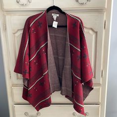 100% Cotton. One Size. Red Jacquard Knit Outerwear For Fall, Casual Red Cape For Autumn, Casual Red Cape For Fall, Fall Red Shawl Cape, Red Shawl Cape For Fall, Oversized Red Cape For Fall, Ruana Wrap, Knit Poncho Sweater, Cowl Neck Poncho