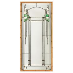 a stained glass door with an arched design