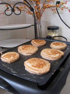 some pancakes are sitting on top of a grill