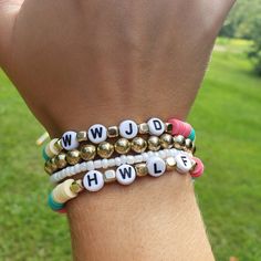 This adorable WWJD bracelets pack is the perfect way to remind yourself in any situation of how Jesus would handle it. With makes it the perfect combination with the  HWLF bracelet! You can choose just one bracelet or the whole stack! Theses adorable Christian bracelets are so cute the wear to church, your job, or anywhere. Plus it comes in custom colors chosen by you to make it extra specially yours! And this Christian stacker bracelet set, would be the perfect gift to remind that special perso Hwlf Bracelets, Christian Beaded Bracelets, Bracelets Jesus, What Would Jesus Do Bracelet, Wwjd Bracelets, He Would Love First, Jesus Bracelet, Verse Bracelet, Pearl House