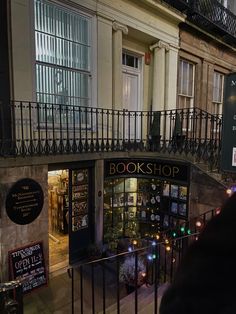 the outside of a book shop at night