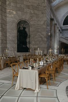 the tables are set up with white tablecloths