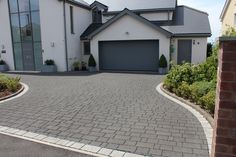 a large house with a driveway in front of it