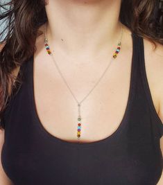 This sterling silver necklace is made with mixed 4mm gemstones: Clear Quartz, Amethyst, Turquoise, Green Aventurine, Tigers Eye, Citrine, Carnelian Each gemstone has a unique property, meaning, and indication. The combination of all the gemstones in one piece of jewelry creates a powerful healing and protective energy. Stimulates all 7 chakras. This necklace measures 19 inches, the hanging part measures 3 inches, and fastens with a silver clasp. Spiritual Sterling Silver Crystal Necklaces, Sterling Silver Gemstone Beads Necklace For Meditation, Sterling Silver Crystal Necklaces For Meditation, Sterling Silver Crystal Necklace With Gemstone Beads For Meditation, Spiritual Sterling Silver Crystal Necklace With Gemstone Beads, Multicolor Sterling Silver Crystal Necklace Gift, Multicolor Crystal Necklace With Natural Stones In Sterling Silver, Multicolor Sterling Silver Crystal Necklace With Natural Stones, Spiritual Sterling Silver Beaded Necklaces With Gemstone