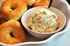 bagels and dip in a bowl on a table