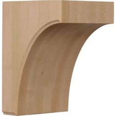 an unfinished wooden shelf with curved edges