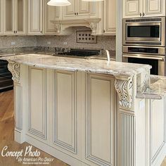 a large kitchen with an island in the middle and marble counter tops on both sides