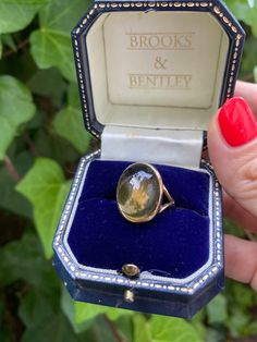 Gorgeous statement ring, 9ct gold cabochon citrine, UK size O, US size 7.25. The stone measures approx 2cm x 1.5cm. Gold Dome Cabochon Ring In 14k Gold, Gold Open Ring Moonstone Cabochon, Gold Open Moonstone Ring With Cabochon, Gold Cabochon Moonstone Open Ring, Gold Cabochon Domed Rings, Gold Moonstone Cabochon Open Ring, Hallmarked Gold Oval Topaz Ring, Hallmarked Oval Gold Topaz Ring, Gold Oval Hallmarked Topaz Ring