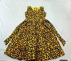 This piece is a gathered dress made with African Print. Cute babies in Frock Dress made with African Print Fitted Sleeveless Yellow Cotton Dress, Yellow Fitted Sleeveless Cotton Dress, Baby African Clothes, African Kids Clothes, African Skirt, Clothing Tips, African Dresses For Kids, African Fashion Skirts