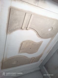 the ceiling has been painted with white paint