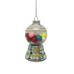 a glass ornament with candy in it