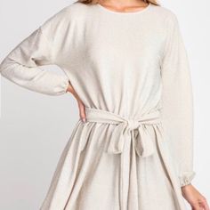 Short Long Sleeve Tie Around The Waist Dress Long Sleeve Shimmer Dress For Date Night, Chic Shimmer Dresses For Fall, Long Sleeve Shimmer Dress For Spring, Chic Glitter Dresses For Spring, Chic Glitter Dress For Spring, Chic Long Sleeve Mini Dress With Shimmer, Chic Long Sleeve Shimmer Mini Dress, Spring Holiday Party Dress With Glitter, Glitter Dress For Spring Holiday Party