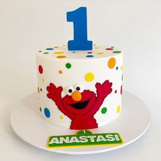 a birthday cake with the number one on it