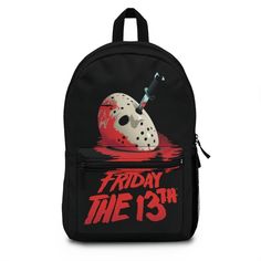 "Friday the 13th Backpack. Features the mask of Jason Voorhees with a knife stabbed in it. Perfect for every day use or your next trip to Halloween Horror Nights at Universal Studios Theme Park! Got snacks? With our roomy and durable backpack, you will be able to bring them all! This bag is made from spun polyester and weights 1.3 lbs - just enough to be light, strong and long-lasting. Grab it, stow it, throw it onto the seat next to you, this backpack can take it, and so will you, wherever you Halloween Themed Travel Backpack, Themed Backpack For Everyday Use And Halloween, Themed Halloween Travel Backpack, Black Backpack For Halloween Travel, Black Standard Backpack For Halloween, Black Halloween Standard Backpack, Black Novelty Backpack For Halloween, Novelty Black Backpack, Black Backpack For Halloween