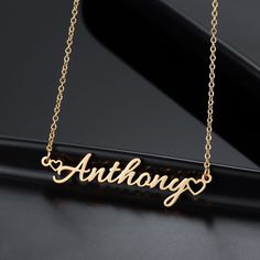 Introducing our Dainty Name Necklace featuring delicate cursive font and a mini heart charm personalized and custom-made with your desired text. Our nameplate jewelry is handcrafted with 18k Gold-plated Stainless Steel meaning it is waterproof, hypoallergenic, NON TARNISH, and everlasting.  DETAILS: -Materials: 18k Gold plated, 18k Rose Gold plated, or Stainless Steel. -Waterproof, NON TARNISH, rust-resistant, hypoallergenic and everlasting. -Chain Lengths: 14 inches, 16 inches, 18 inches, 20 in Customizable Minimalist Letter Jewelry, Minimalist Customizable Letter Jewelry, Personalized Heart Pendant Name Necklace In Minimalist Style, Minimalist Heart Name Necklace For Personalized Gift, Minimalist Personalized Heart Pendant Name Necklace, Personalized Minimalist Heart Pendant Name Necklace, Minimalist Heart-shaped Personalized Name Necklace, Minimalist Personalized Letter Jewelry, Minimalist Customized Name Necklace As Personalized Gift