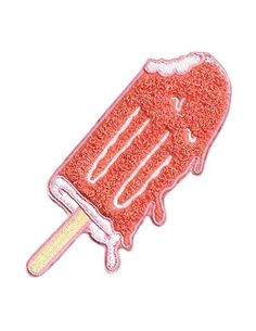 an ice cream stick embroidered patch on a white background