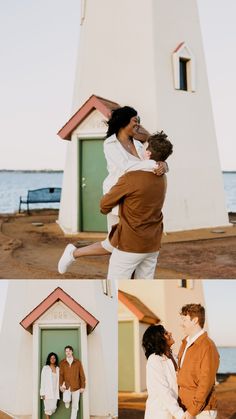 two people are standing in front of a lighthouse and one person is holding the other