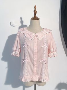 Size 			S 			L 		 		 			Full Length 			52 			56.5 		 		 			Bust 			105 			120 		 		 			Waist 			95 			112 		 		 			Shoulders 			37 			41.5 		 		 			Sleeve Length 			27 			29.5 Feminine Doll Collar Blouse For Spring, Pink Casual Blouse With Doll Collar, Casual Pink Blouse With Doll Collar, Cute Pink Blouse For Daywear, Feminine Doll Collar Blouse For Summer, Feminine Short Sleeve Shirt With Ruffles, Feminine Summer Blouse With Doll Collar, Pink Short Sleeve Feminine Blouse, Feminine Pink Short Sleeve Shirt