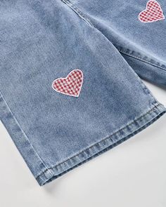 Details: Denim shorts with heart print patternBottom Length: ShortMaterials: 50% Cotton + 50% Polyester * Note: All new denim products come with button holes knitted to make sure such product is 100% new from suppliers Cute Denim Blue Cotton Shorts, Cute Cotton Jean Shorts, Cute Cotton Jeans For Summer, Cute Summer Cotton Jeans, Cute Denim Blue Bottoms, Cute Denim Blue Denim Bottoms, Cute Jean Shorts With Pockets, Cute Cotton Jeans With Pockets, Cute Blue Shorts With Pockets