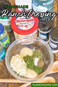 ingredients for homemade ranch dressing in a bowl with wooden spoons and jars on the side