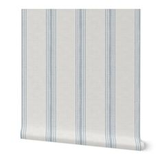 a white and blue striped wallpaper